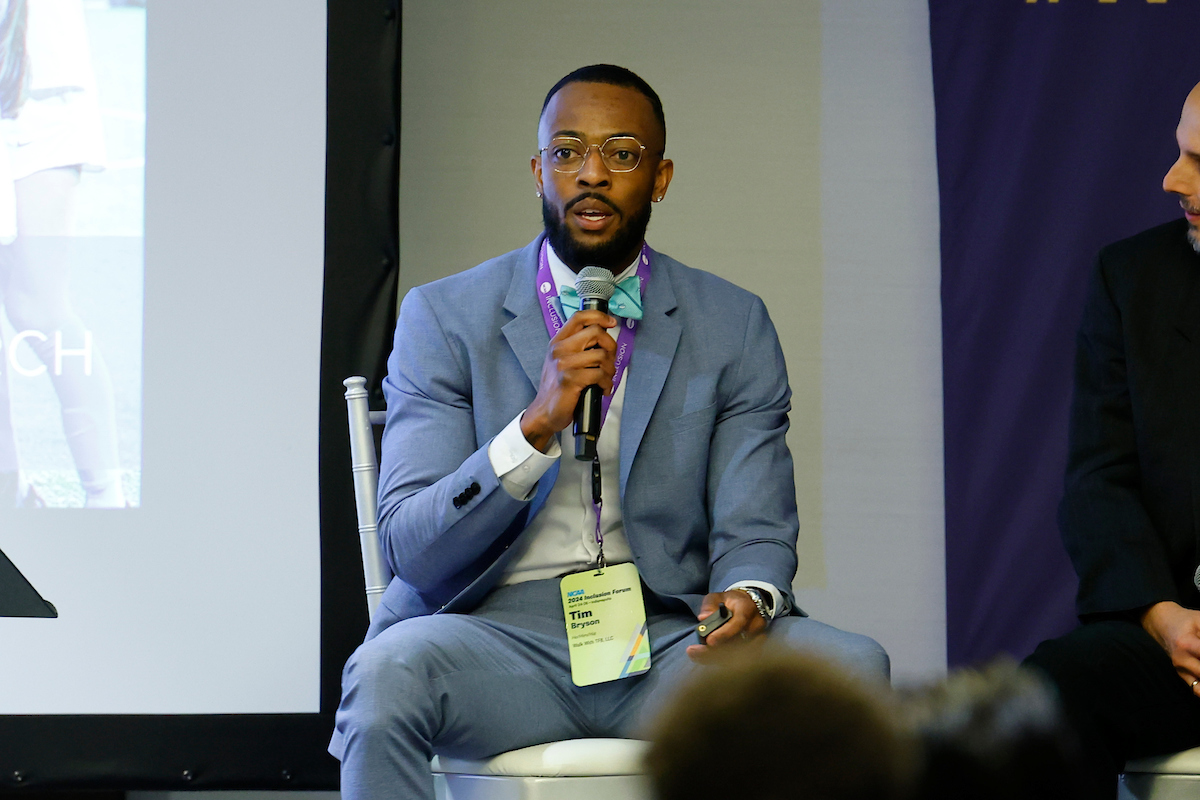 Timothy speaking on a panel at the NCAA Inclusion Forum